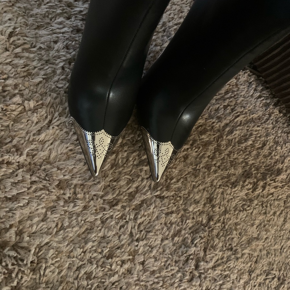 Metal cap toe stiletto boots